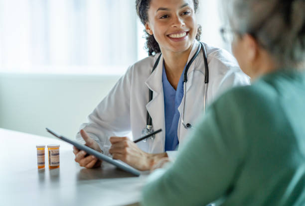 istock Talking About New Medications with a Patient 1392555762