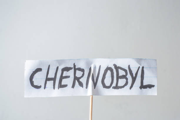 istock Chernobyl,word written on a cut paper,soured white background and copy space 1392555768