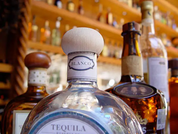 close up of tequila bottles