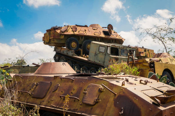 istock Destroyed War Machines and Tanks rounded by Cactuses on the Tank Graveyard in Asmara 1392563145