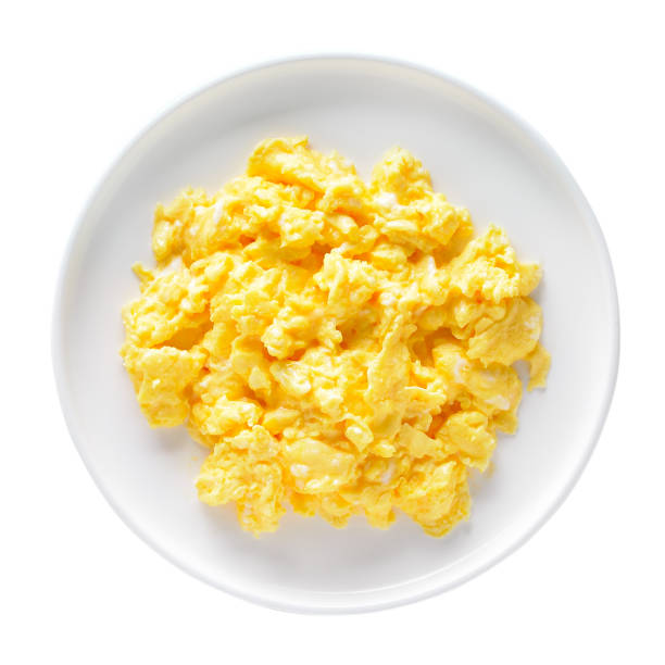 Scrambled eggs on plate stock photo