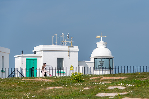 Torquay, UK. Saturday 16 April 2022. Very short Berry Head Lighthouse on the coast in Devon.