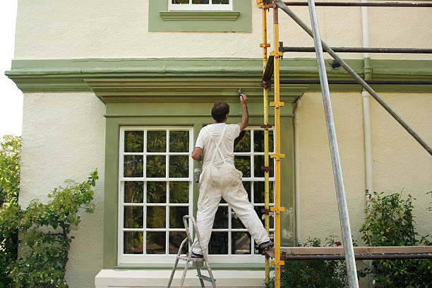 Painter 1 Painter and decorator working. house painter stock pictures, royalty-free photos & images