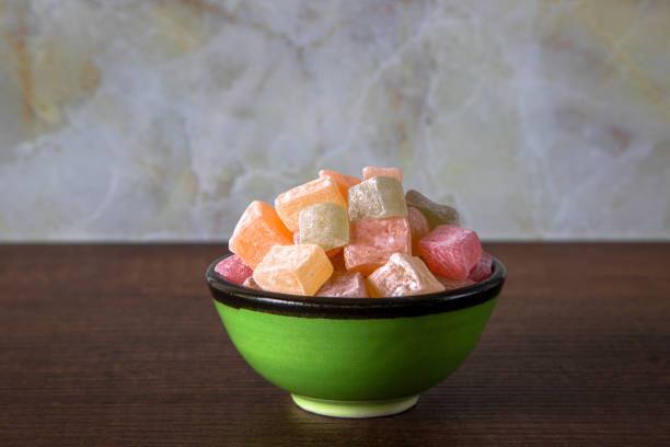 istock Traditional Turkish delight in a bowl on a wooden background 1392573684