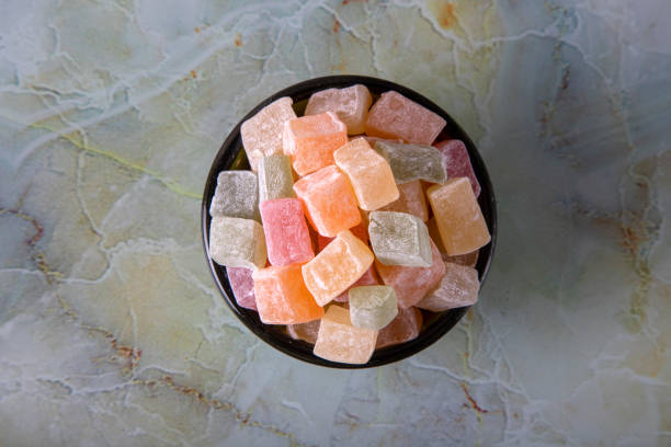 istock Traditional Turkish delight in a bowl on a marble background 1392574237