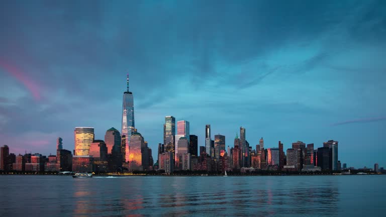 Full day to night time lapse of the Lower Manhattan skyline from across the Hudson River.