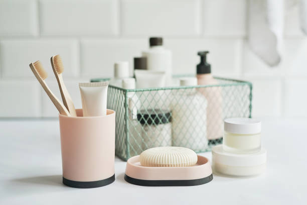 istock Bath accessories. Dressing table. Cosmetics and hygiene products. Spa and beauty salon. Toothbrush and soap, cream containers 1392575010