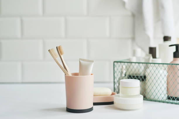 istock Bath accessories. Dressing table. Cosmetics and hygiene products. Spa and beauty salon. Toothbrush and soap, cream containers 1392575012