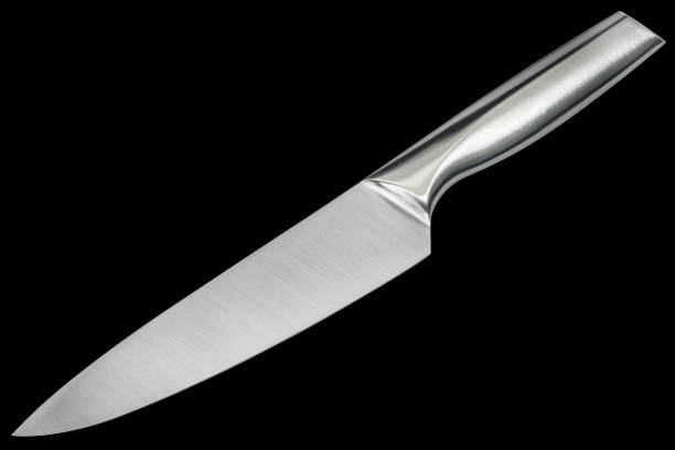 istock Stainless Steel Kitchen Chef's Knife Isolated on Black Background 1392576950