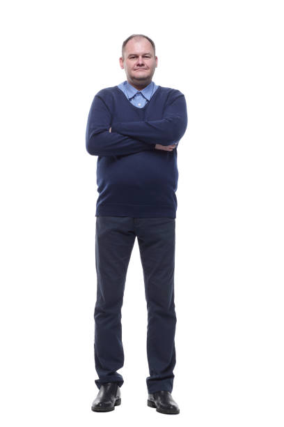 istock full-length. mature man in a blue jumper 1392577482
