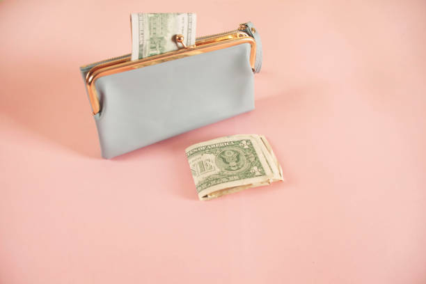 istock with money wallet on the white table 1392578777