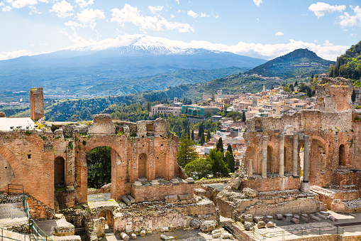 Ancient theatre in Taormina, Sicily. Beautiful pamoramic view in sunny summer day.
