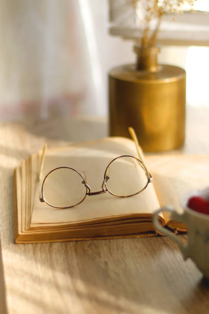 istock Raspberries, Book and Glasses 1392580179