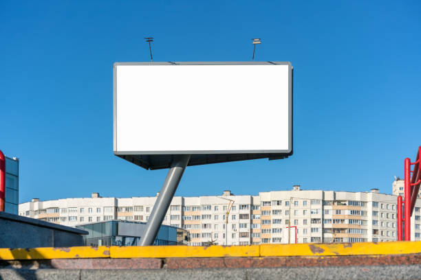 istock Blank billboard with empty space for mock up stands at urban street 1392583402