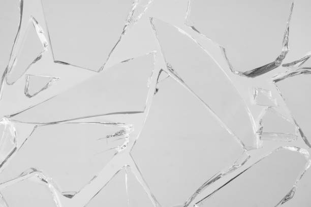 istock Texture of broken glass close up. 1392583428