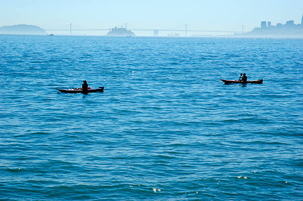 kayakers 실루엣 - arpia 뉴스 사진 이미지