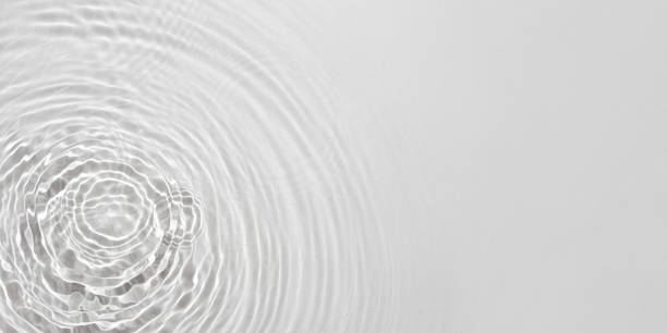 istock The texture of water on a gray background. 1392585980