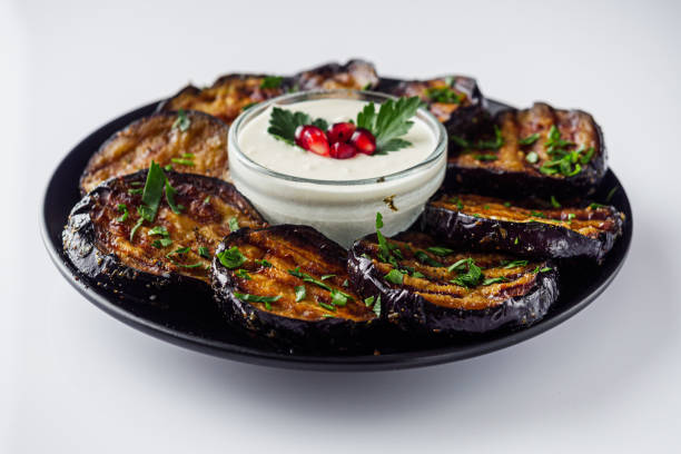 istock grilled eggplant in Georgian style on a white acrylic background 1392587570