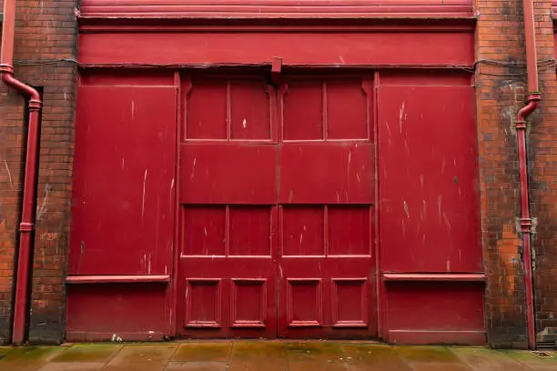 Photo of Red industrial doors.