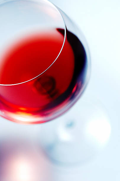 Abstract glass of red wine stock photo