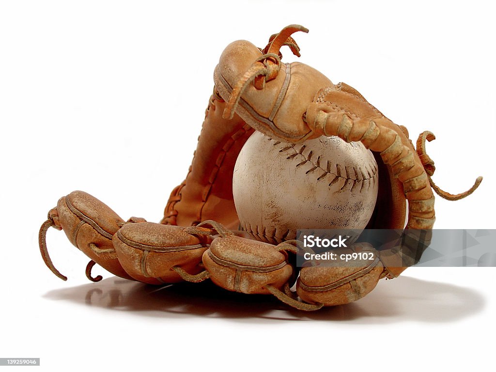 Baseball & glove Isolation shot of a mid-sized (slightly larger than a baseball) ball & a glove on a white background. Baseball - Ball Stock Photo