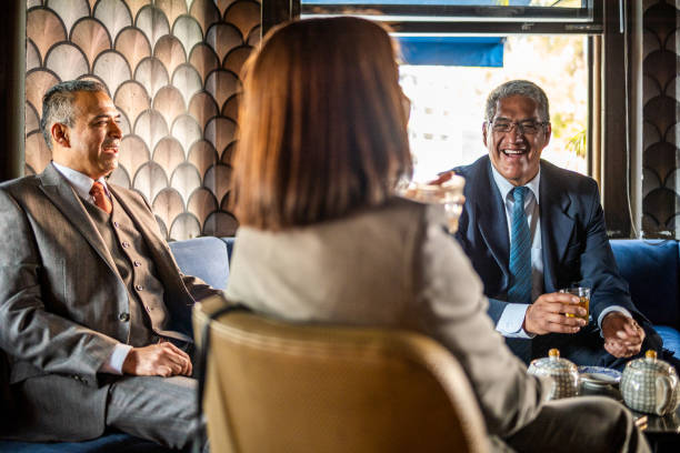 istock Three business persons having meeting 1392593399