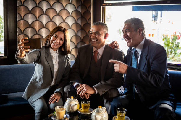 istock Business partners taking selfie 1392593573