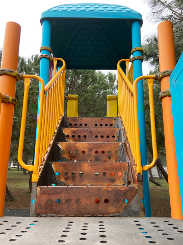 Children playground rusty iron metal staircase