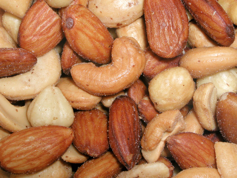 a close-up of salted, mixed nuts