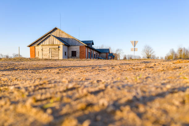 Old Countryside Barn in Distance with Blurred Foreground