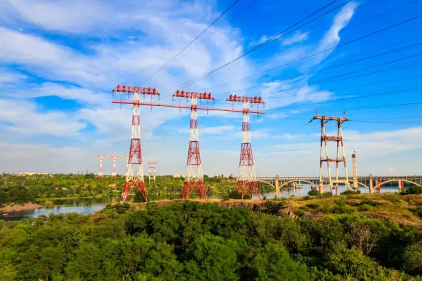 High voltage power line across the Dnieper river on Khortytsia island in Zaporizhia, Ukraine