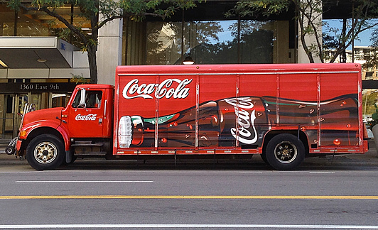 Cleveland, Ohio, USA - April 04, 2020: Big red Coca Cola truck on the street