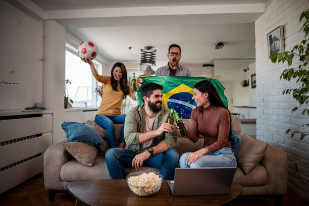 istock fans are watching the  football on TV 1392606801