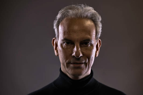 istock Portrait of a man in black 1392609013