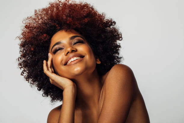 istock Beautiful afro woman with perfect make-up 1392610133