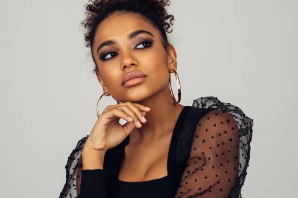 istock Beautiful afro woman with perfect make-up 1392610171