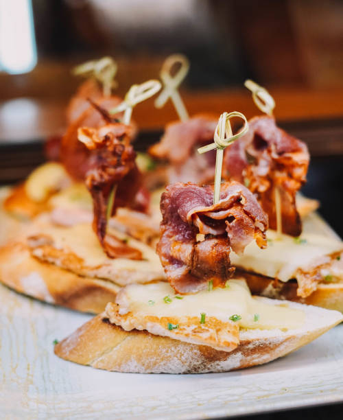 canapes with ham, croquettes and cheese