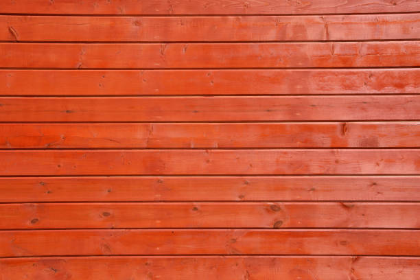 Background from red old wooden boards (wooden beam). Vintage texture, background