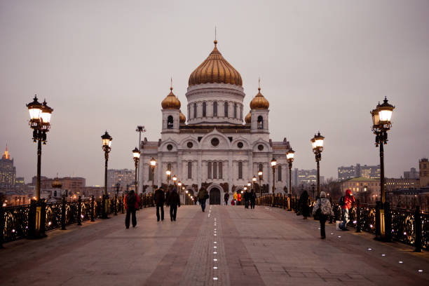 Cathedral of Christ the Saviour, Moscow, seen from Patriarshy Bridge, tourists in distance