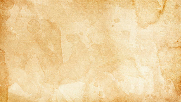 istock Texture of old paper covered with stains 1392629618