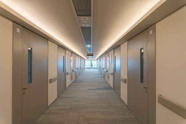 istock empty corridor in modern hospital with decoration. 1392631096
