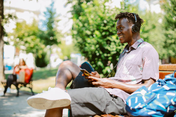 istock taking a break, listening to music 1392632879