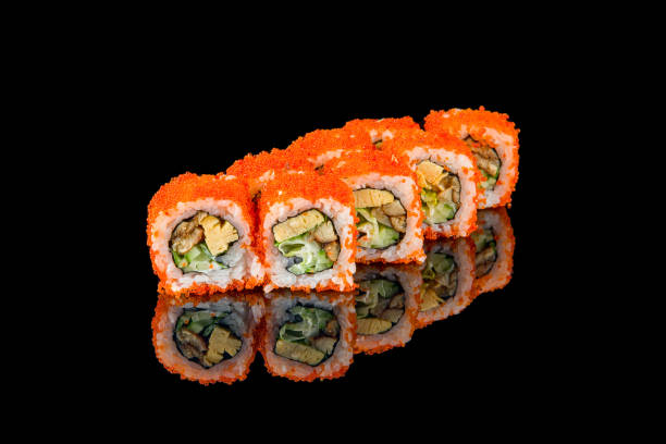 istock California roll with crab on black with reflection 1392633857