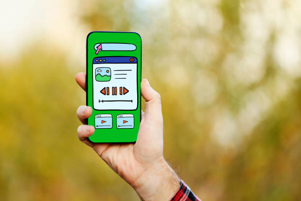 Man holding mobile phone with mobile app screen