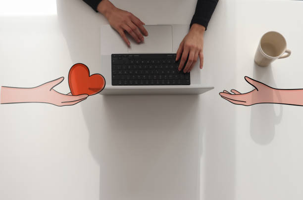 istock Woman using laptop with non profit organization concept 1392638889