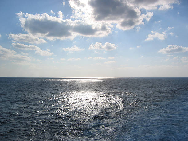 Ocean Clouds Sun stock photo