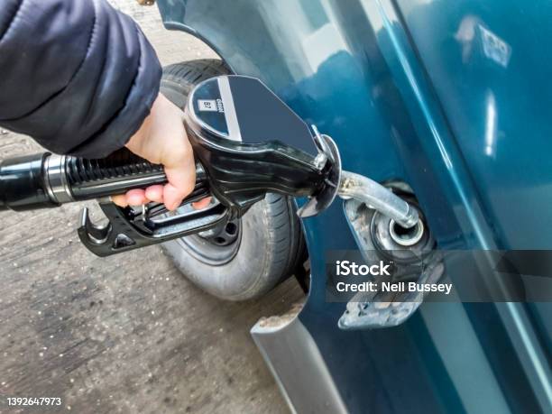 Using The Diesel Fuel Pump At Tesco Petrol Stationkidderminster Stock Photo - Download Image Now