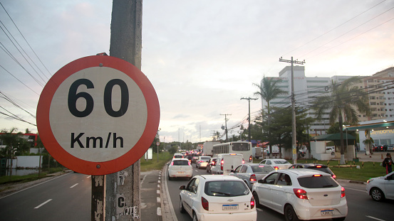 lauro de freitas, bahia, brazil - april 20, 2022: traffic signs indicate a maximum speed of 60 kilometers per hour on a transit route.