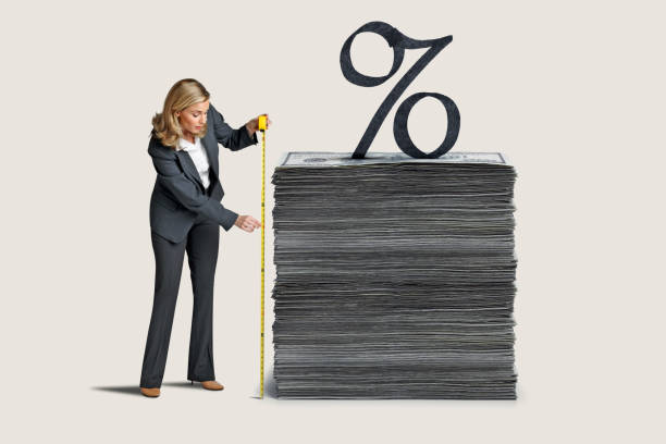 istock Woman Measuring Inflation 1392650408