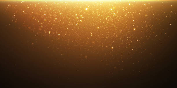 istock Sparkling magical dust particles.The dust sparks and golden stars shine with special light. 1392652227